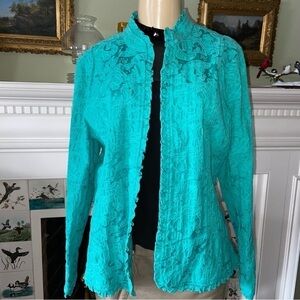 Beautiful aqua textured jacket by Additions in Chico’s size 2 with ruffles.